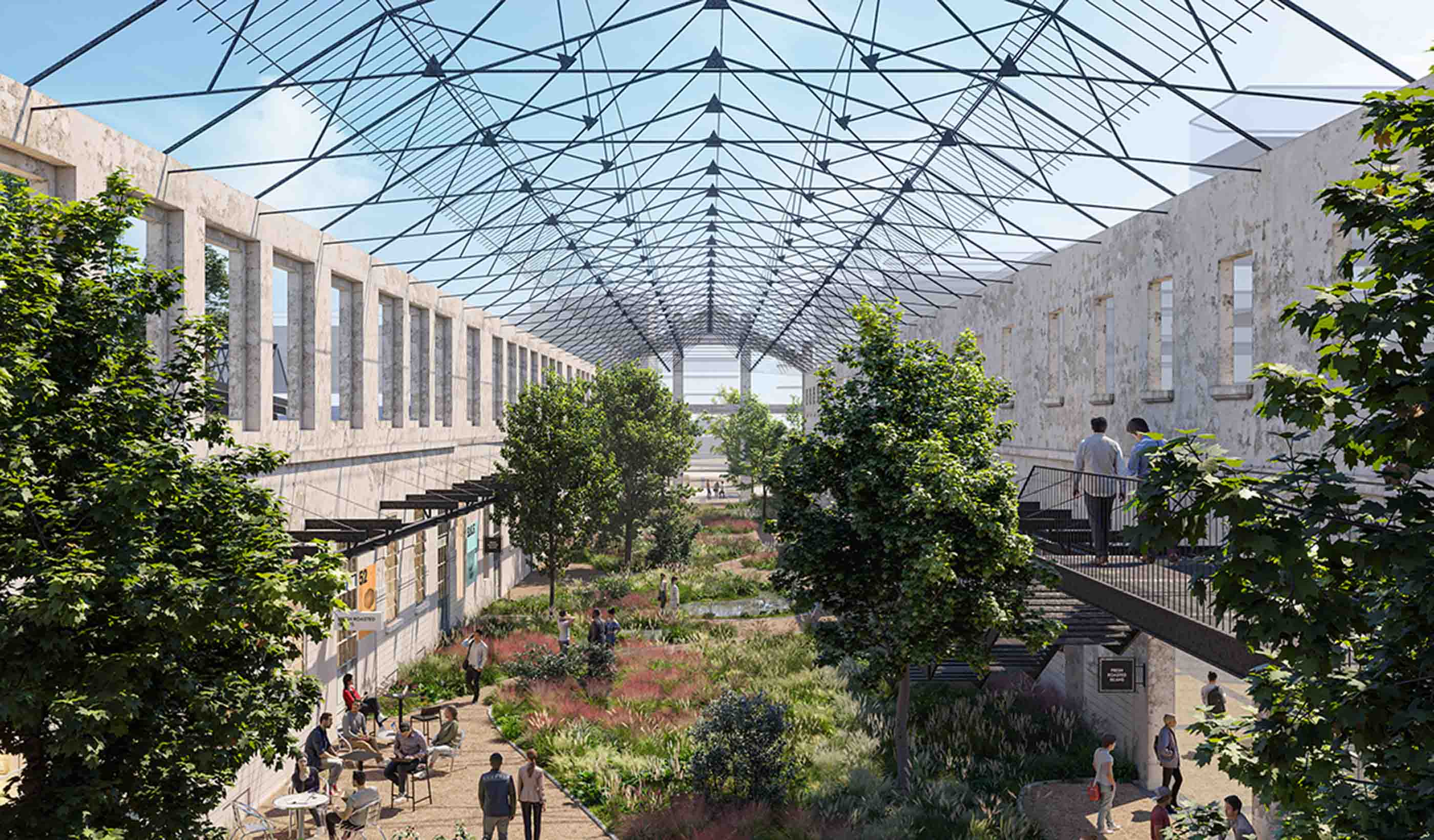 Atrium between buildings with plantings and people